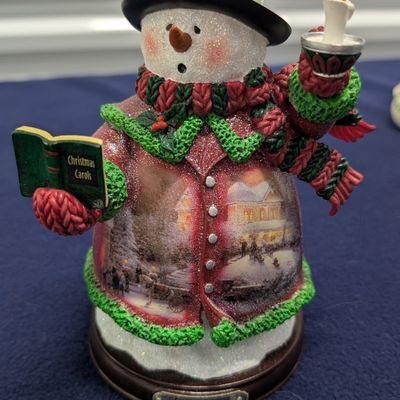 Sale Photo Thumbnail #65: Thomas Kinkade 4 pc Snowman and 1 Angel figurine