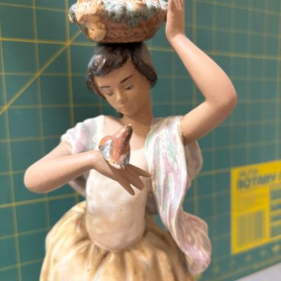 Sale Photo Thumbnail #217: 1970 Lladro "Florista camminante y pajarito" boxed". Like new no chips or flaws