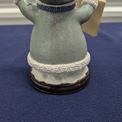Sale Photo Thumbnail #63: Thomas Kinkade 4 pc Snowman and 1 Angel figurine