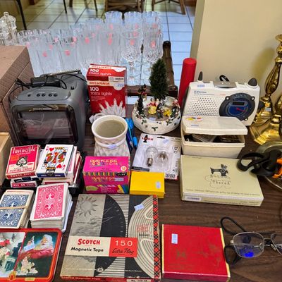 Assortment of vintage household items, including a small Philips television, an Emerson radio, playing cards, Scotch magnetic tape, and...