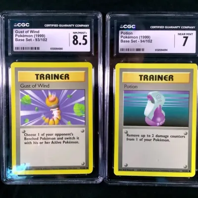(2) 1999 Pokémon Cards Base Set 2 (Wind & Potion) Both CGC Graded 
