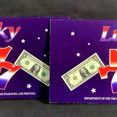 (2) 2009 $1 Uncirculated Federal Reserve Notes With “7’s” In The Serial Numbers 