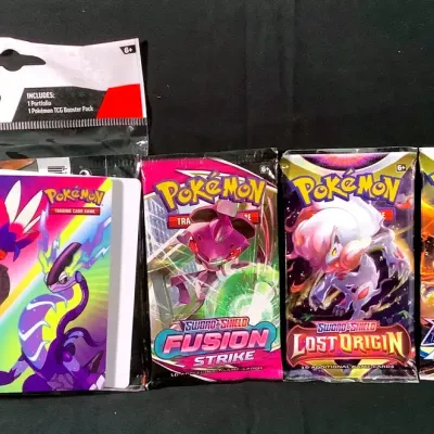(3) Sealed Pokémon Booster Packs & (1) Scarlet & Violet Mini Portfolio With Booster Pack