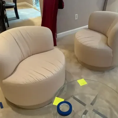 Pair of barrel/swivel lounge chairs