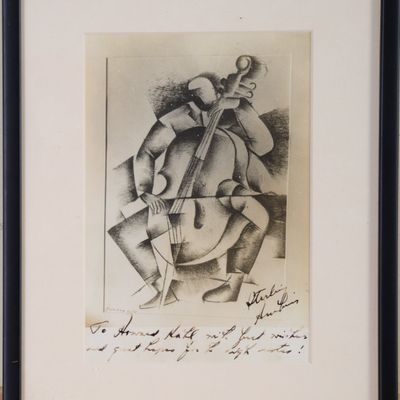 Sale Photo Thumbnail #311: Signed Cubist Print of a Man Playing a Cello.