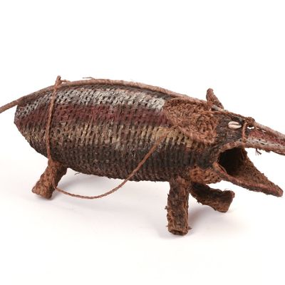 Sale Photo Thumbnail #317: African Woven Warthog Figure.