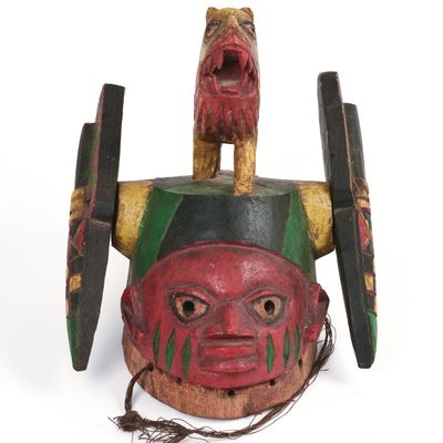 Sale Photo Thumbnail #320: African Carved Mask With Lion.