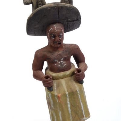 Sale Photo Thumbnail #291: African Carved Figure of a Seated Man.