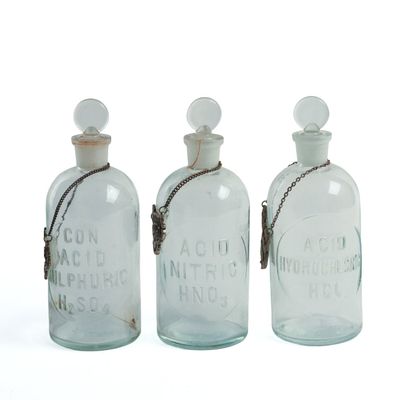 Sale Photo Thumbnail #220: Three Blown Glass Acid Bottles.