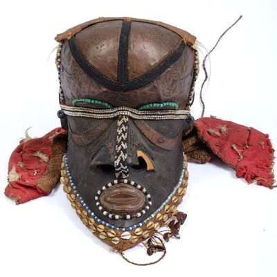 Sale Photo Thumbnail #290: African Tribal Mask With Shells.