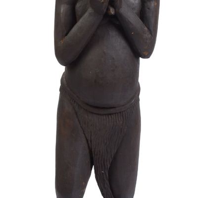 Sale Photo Thumbnail #344: African Carved Sculpture of a Boy.