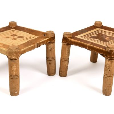 Sale Photo Thumbnail #158: Pair of African Hide Stools.