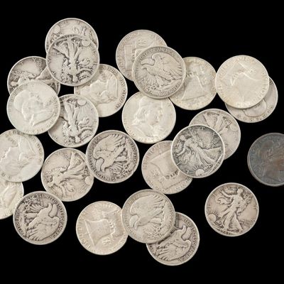 Sale Photo Thumbnail #153: Twenty Five Franklin Walking Liberty And 1898 Barber Silver Half Dollars