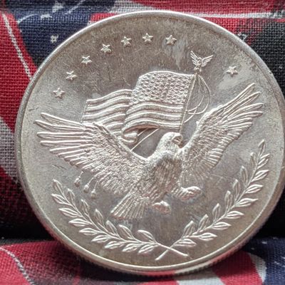 Sale Photo Thumbnail #171: Eagle & US Flag 1 Troy Oz .999 Fine Silver Trade Unit Round