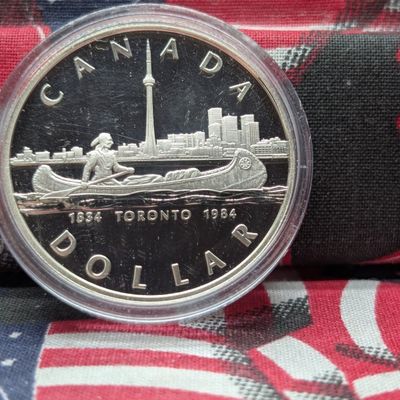 Sale Photo Thumbnail #60: 1984 Toronto Canada 150th Anniversary Commemorative 50% "Silver" Dollar, 23.32G