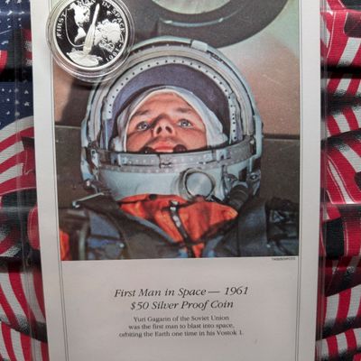 Sale Photo Thumbnail #242: 1989 Marshall Islands First Man In Space $50 Silver Proof Commemorative Coin, One Troy Ounce .999 Silver