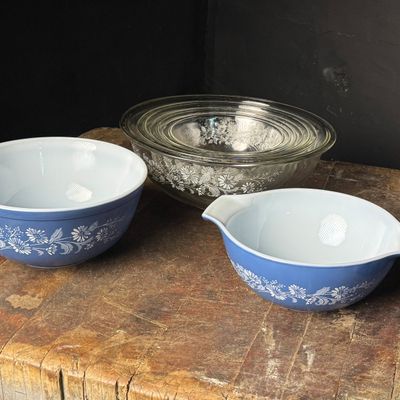 A Collection of Pyrex Colonial Mist Pattern Mixing Bowls