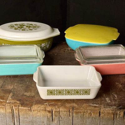 A Collection of Vintage Pyrex Spring Blossom Green and Solid Color Kitchenware