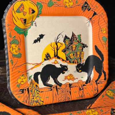 A Set of Six Vintage Halloween Square Paper Plates with Black Cat and Haunted House Motifs