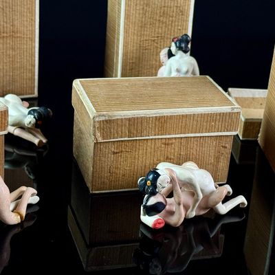 A Set of Six Miniature Hand-Painted Biscuit Porcelain Erotic Figural Groups in Boxes