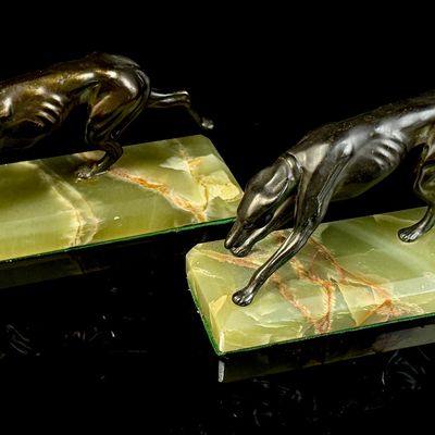 A Pair of Art Deco Bronze Greyhound Bookends on Onyx Bases