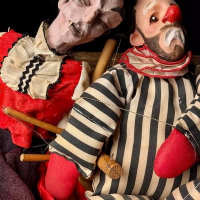 A Pair of Vintage Composition and Wood Marionettes Featuring Vampire and Sad Clown Characters
