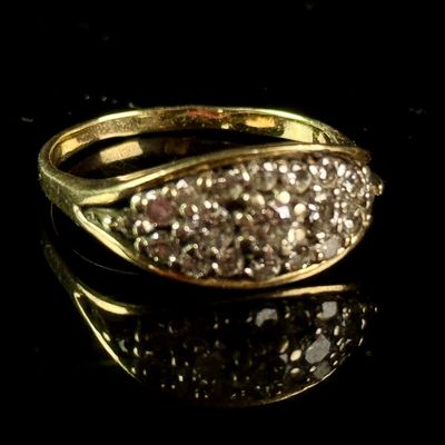 A 14 Karat Yellow Gold and Diamond Marquise Cluster Cocktail Ring