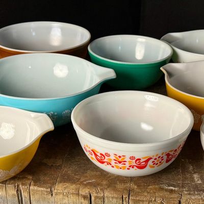 Nine Piece Collection of Vintage Pyrex Opal Glass Bowls in Friendship, Butterprint, and Butterfly Gold Patterns