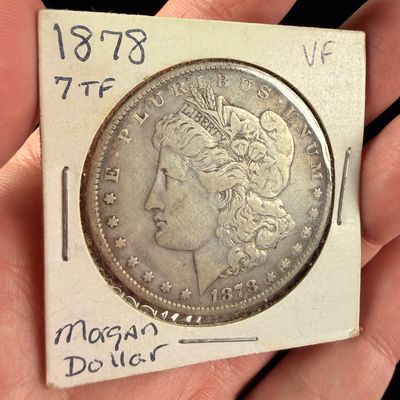 Sale Photo Thumbnail #117: US 1878 Morgan Silver Dollar, 7 Tail Feathers Variety