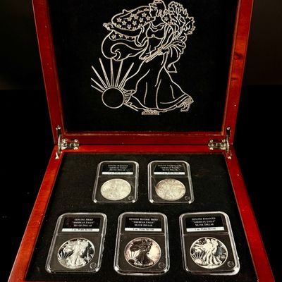 Sale Photo Thumbnail #140: A Set of five US $1 American Eagle Silver Dollars in PCS Stamps & Coins Holders