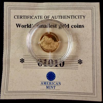 Sale Photo Thumbnail #161: 2001 Liberia 25 Dollars Mount Rushmore 24 Karat .999 Pure Gold Proof Coin and American Mint COA
