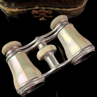 Sale Photo Thumbnail #70: A Pair of Victorian Mother-of-Pearl and Silver-Toned Metal Opera Glasses with Original Fitted Case
