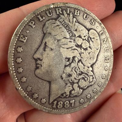 Sale Photo Thumbnail #39: 1887 US Silver Morgan Dollar