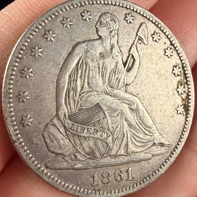 Sale Photo Thumbnail #18: 1861 United States Seated Liberty Silver Half Dollar