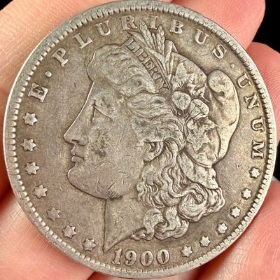 Sale Photo Thumbnail #28: A 1900-O Morgan Silver Dollar