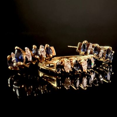 Sale Photo Thumbnail #34: A 14K Yellow Gold Sapphire and Diamond Jewelry Suite Including a Ring and a Pair of Matching Earrings