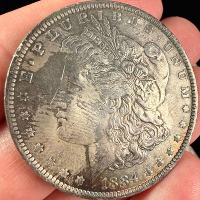 Sale Photo Thumbnail #107: 1884-O US Morgan Silver Dollar