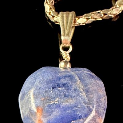 Sale Photo Thumbnail #25: Sterling Silver and 14 Karat Gold-Filled Necklace with Rough-Cut Heart-Shaped Blue Stone Pendant
