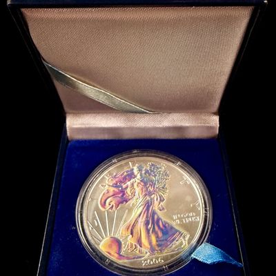 Sale Photo Thumbnail #192: US 2006 American Silver Eagle 1 oz Fine Silver One Dollar Coin with Aftermarket Holographic Finish