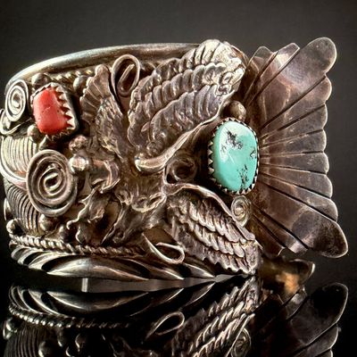 Sale Photo Thumbnail #101: Allan Chee Navajo Sterling Silver Eagle Motif Cuff Bracelet with Turquoise and Coral
