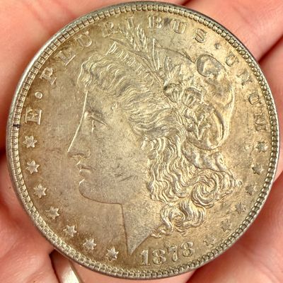 Sale Photo Thumbnail #36: An 1878 United States Morgan Silver Dollar 8 Tail Feathers Variety