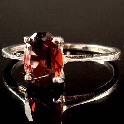 Sale Photo Thumbnail #179: Sterling Silver Solitaire Ring with Oval-Cut Garnet-Colored Gemstone