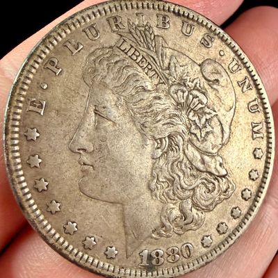 Sale Photo Thumbnail #105: 1880 US Morgan Silver Dollar