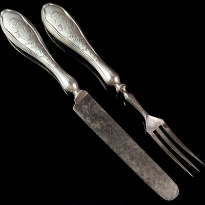 Sale Photo Thumbnail #126: A Pair of Sterling Silver Handled Little Miss Muffet Pattern Child's Flatware Pieces
