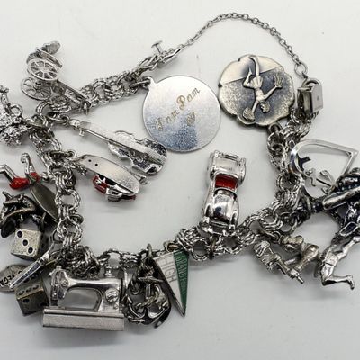 Sale Photo Thumbnail #317: Vintage 925 Charm Bracelet with 17 Charms