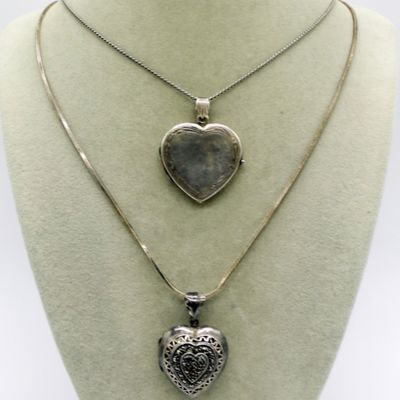 Sale Photo Thumbnail #356: Two Sterling Heart Lockets on Long Chains