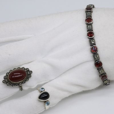 Sale Photo Thumbnail #66: Carnelian, Onyx, Blue Topaz & Garnet Rings, Bracel