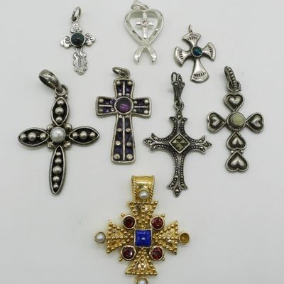 Sale Photo Thumbnail #178: Eight Sterling Cross Pendants