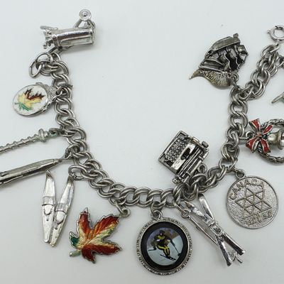 Sale Photo Thumbnail #60: Vintage 925 Charm Bracelet, 13 Charms