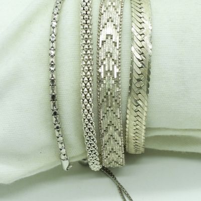 Sale Photo Thumbnail #220: Four Sterling Bracelets